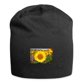 Sonnenblumen Blütenkopf ragt aus einem Feld hervor - Jersey-Beanie - Schwarz - Vorne