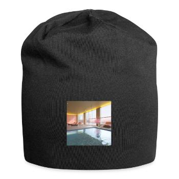 Ein sonnendurchfluteter Lounge-Bereich art 2 - Jersey-Beanie - Schwarz - Vorne