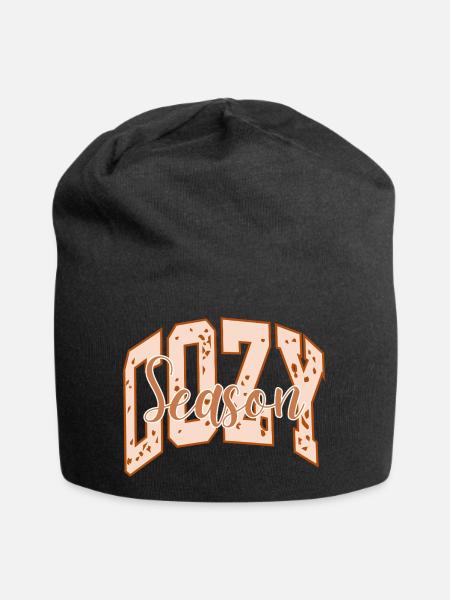 Cozy Season Explosionsmuster und fette Typografie - Jersey-Beanie - Schwarz