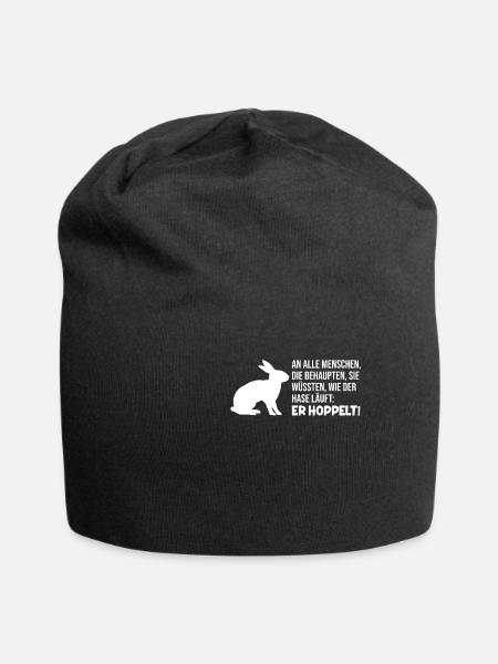 Der Hase hoppelt | Klugscheißer, Besserwisser - Jersey-Beanie - Schwarz