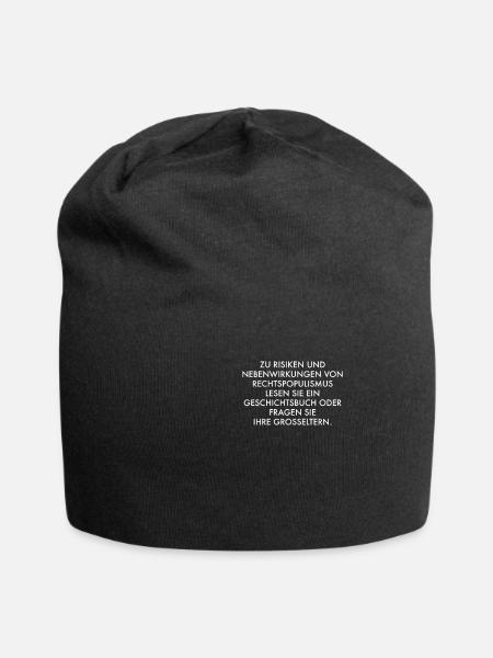 Zu Risiken und Nebenwirkungen Antirassismus - Jersey-Beanie - Schwarz