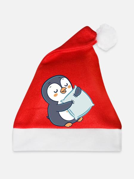 Pinguin kuschelt auf Kissen - Weihnachtsmütze - Rot