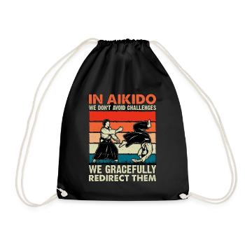 Im Aikido fordern wir nicht anmutig heraus, sondern - Turnbeutel - Schwarz - Vorne