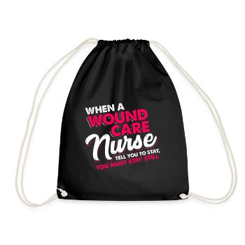 When a wound care nurse tell stay still you MUST - Drawstring Bag - black - Front