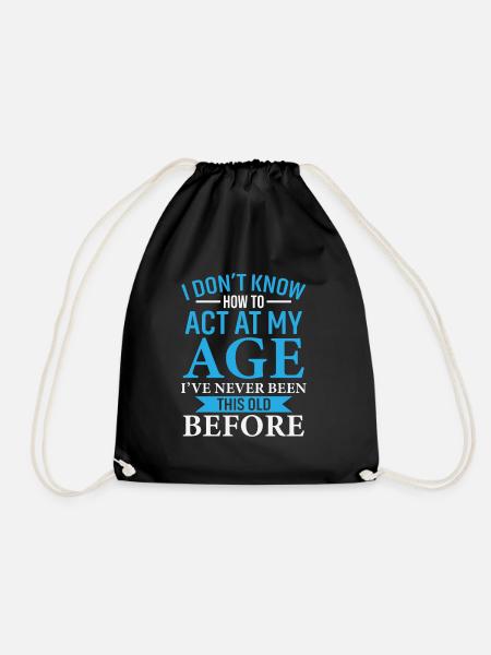 I DON'T KNOW HOW TO ACT AT MY AGE - Drawstring Bag - black