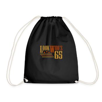 Look Who's 65 Years Old Funny 65th Birthday Gift - Drawstring Bag - black - Front
