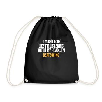 IT MIGHT LOOK LIKE I'M LISTENING BUT IN MY HEAD I' - Drawstring Bag - black - Front