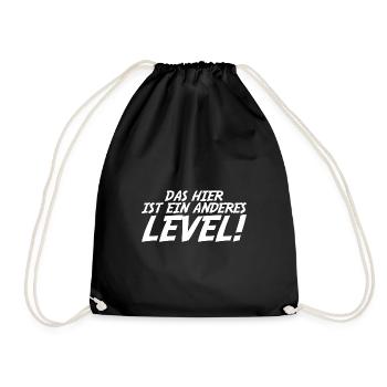 das hier ist ein anderes Level Geschenk - Turnbeutel - Schwarz - Vorne