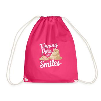 Sculpteurs de sable professionnels sur la plage du - Sac de sport léger - fuchsia - Devant