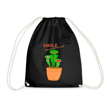 smile while you still have teeth - Drawstring Bag - black - Front