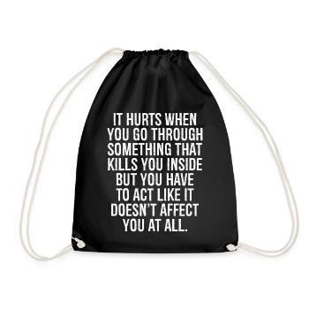 it hurts when you go through something that kills - Drawstring Bag - black - Front