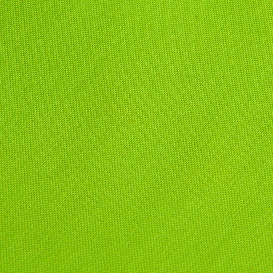 Salt Harbour badge on a drawstring bag, neon green, close-up