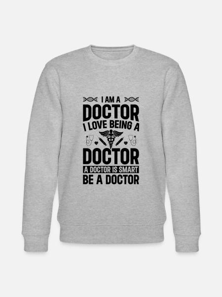 Jeg er læge. Jeg elsker at være læge. En læge er - Stanley/Stella økologisk unisex-sweatshirt CHANGER  - grå meleret