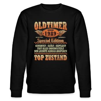 LUSTIG 35. GEBURTSTAG OLDTIMER 1989 EINZELSTÜCK - Stanley/Stella Unisex Bio-Sweatshirt CHANGER  - Schwarz - Vorne - Nik (191cm) & Marisol (170cm)