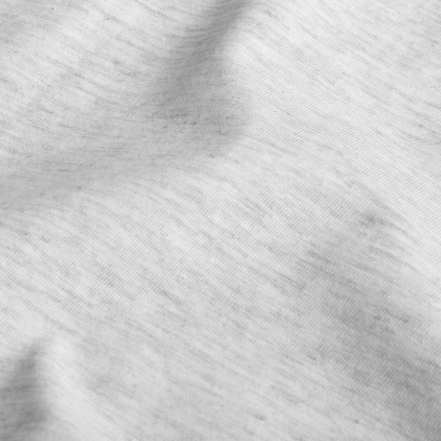 Naples badge on a teenager heavy cotton t-shirt, heather white, close-up