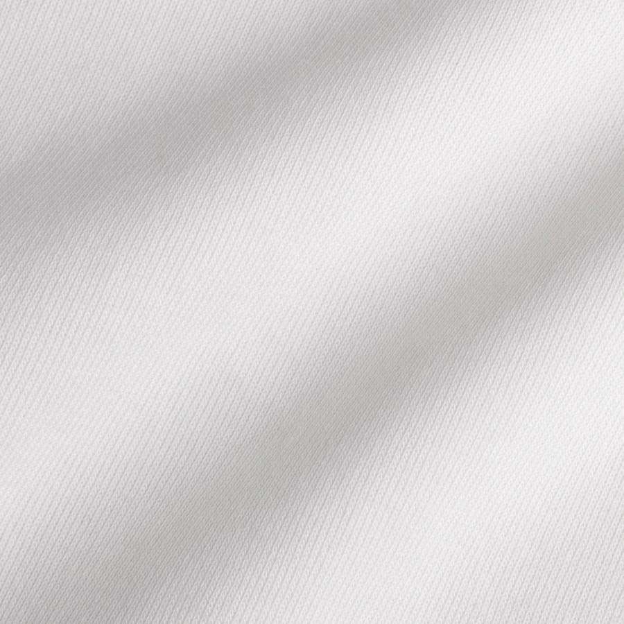 Milan badge on a teenager heavy cotton t-shirt, white, close-up