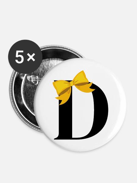 Buchstabe d gelber Knoten - Buttons groß 56 mm (5er Pack) - Weiß
