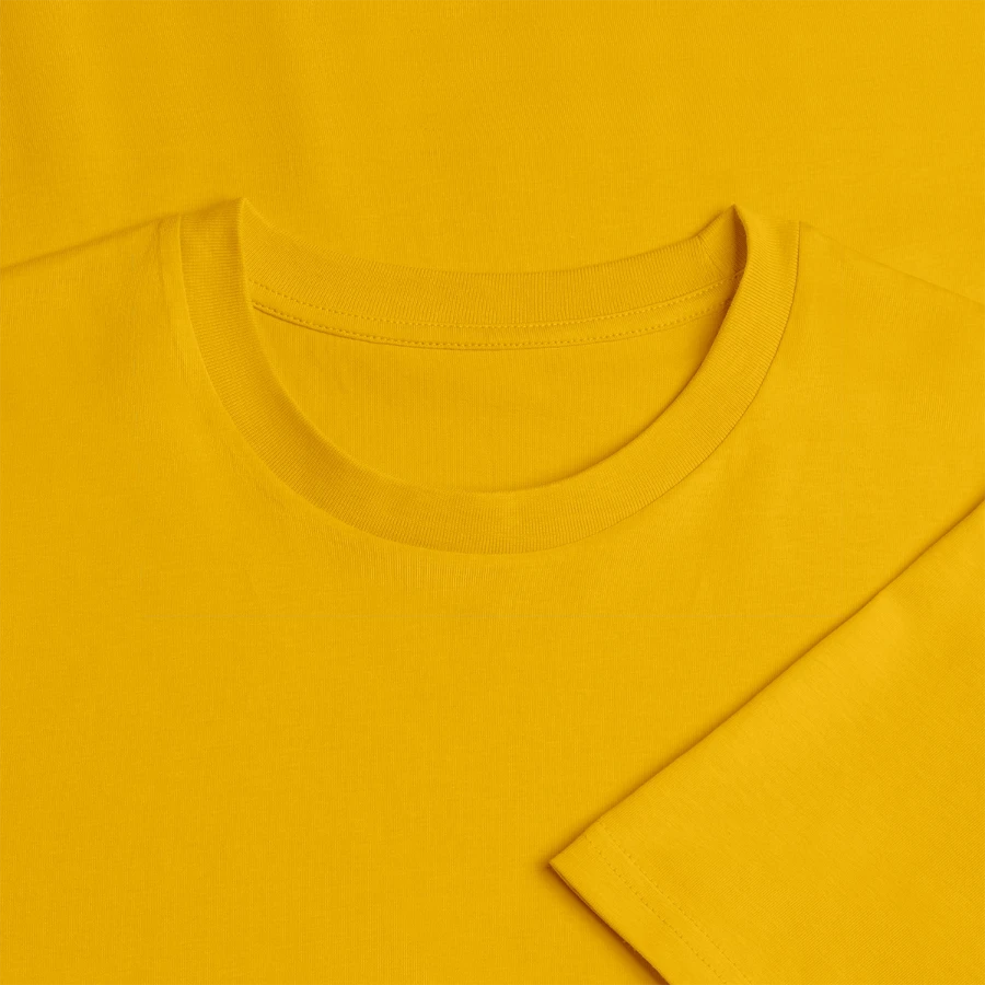 Grindelwald badge on a stanley/stella creator unisex organic t-shirt, spectra yellow, neck label