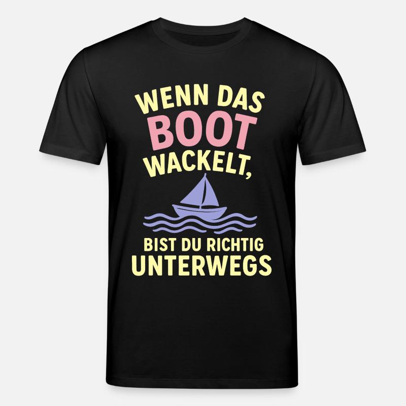 Bootwackel Spruch Reisegefühl - Stanley/Stella Unisex Bio-T-Shirt CREATOR  - Schwarz