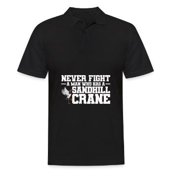 Kranich - Männer Poloshirt - Schwarz - Vorne - Kai (181cm)