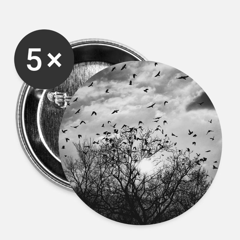 Vol d’oiseau devant le soleil - Lot de 5 petits badges (25 mm) - blanc
