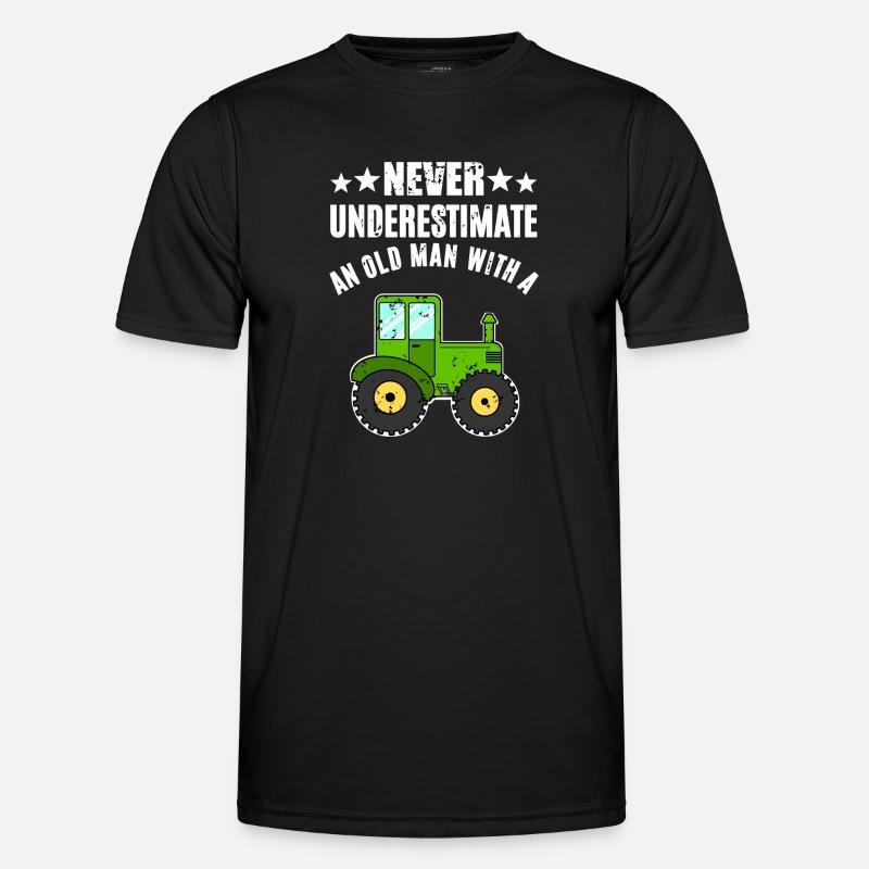 Never Underestimate Traktor - Männer Funktions-T-Shirt - Schwarz