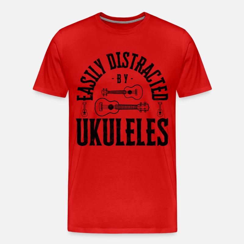 Easily distracted by Ukuleles - Männer Premium Bio T-Shirt - undefined