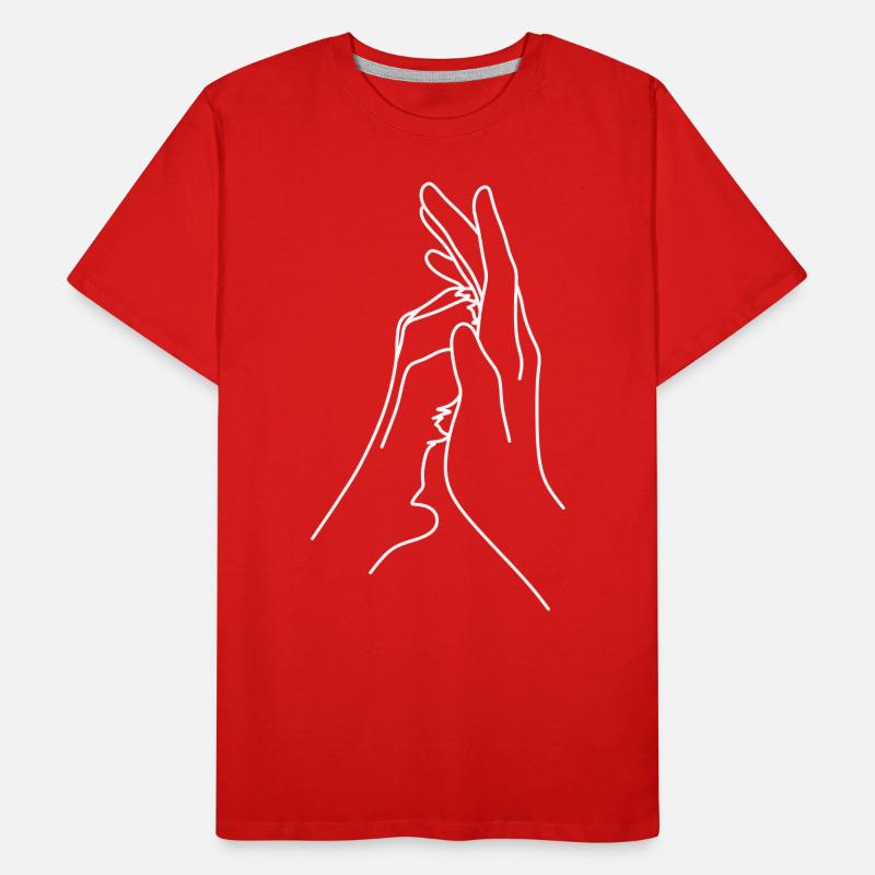 Eine menschliche Hand und eine Hund oder Katzen Männer Premium Bio T-Shirt
