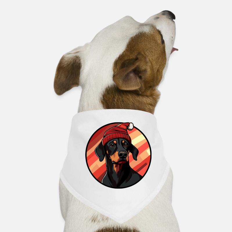 Doberman avec un chapeau de Père Noël Bandana pour chien