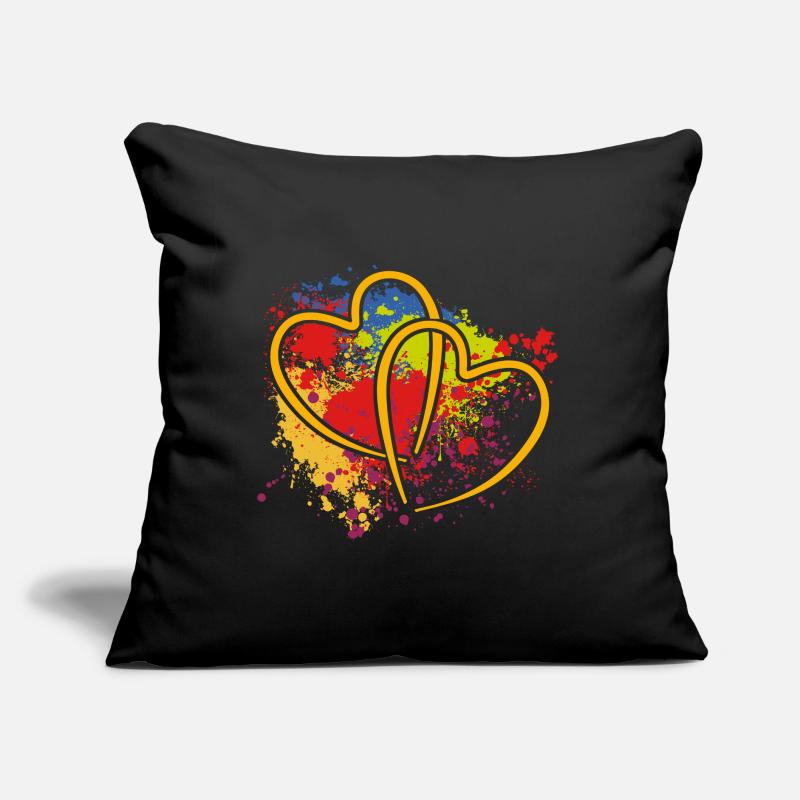 Deux cœurs entrelacés sur des éclaboussures de couleur Coussin et housse de 45 x 45 cm