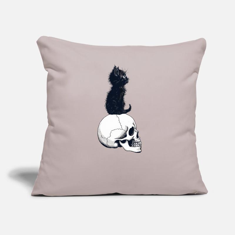 Cute kitten sitting on a skull Sofa pillow with filling 45cm x 45cm