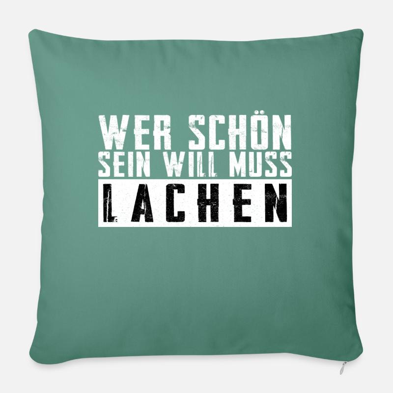Schöner Spruch: Wer schön sein will, muss lachen! - Sofakissen mit Füllung 45 x 45 cm - Tanngrün
