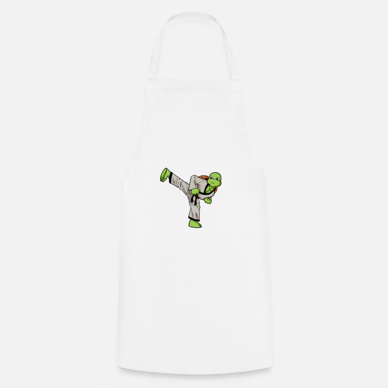 Tortue de dessin animé faisant de l’hapkido - Tablier de cuisine - blanc