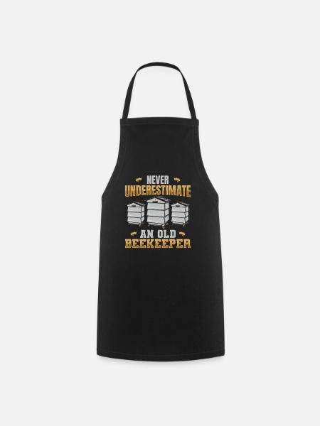 Never Underestimate An Old Beekeeper - Kochschürze - Schwarz