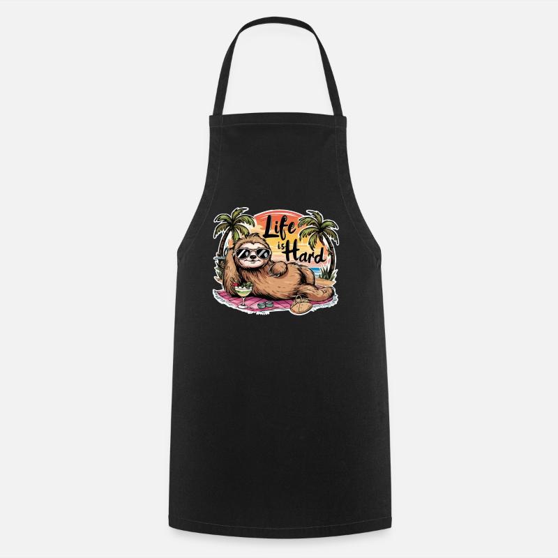 Life is hard, Sloth relaxing at the beach - Cooking Apron - black