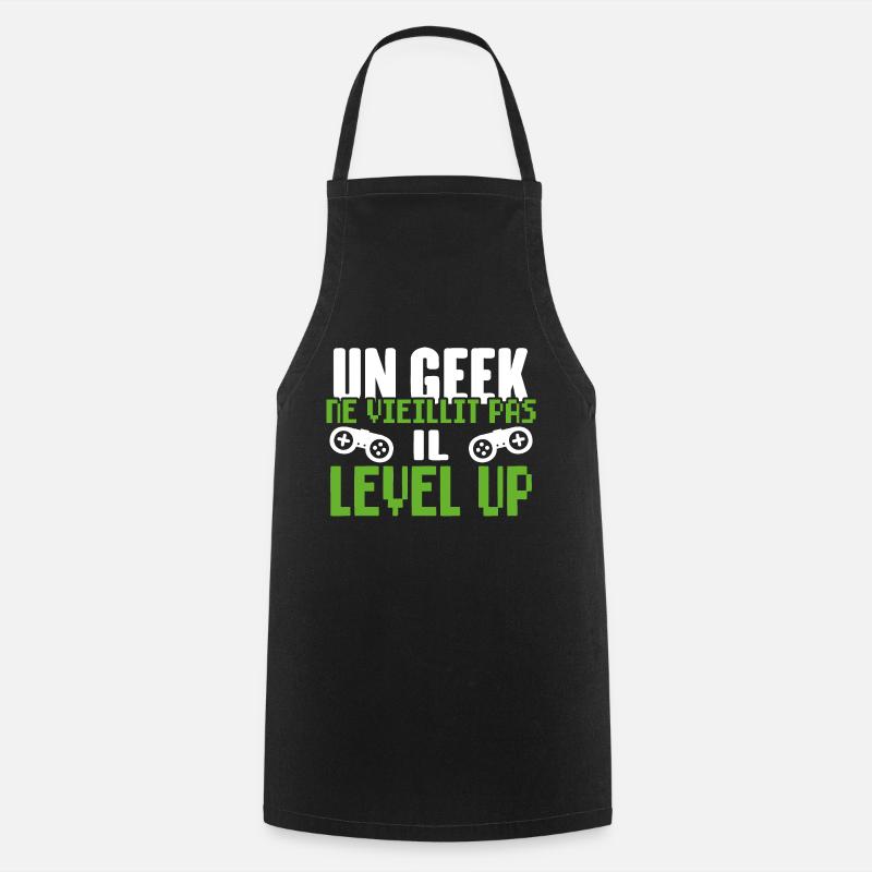 Un Geek Ne Vieillit Pas Il Level Up - Tablier de cuisine - noir