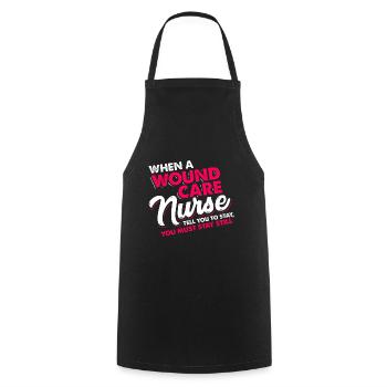 When a wound care nurse tell stay still you MUST - Cooking Apron - black - Front - AI Model Male 185 dark (185cm)