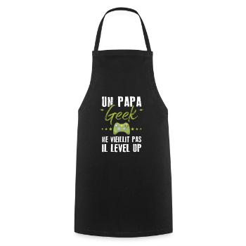 Un papa geek ne vieillit pas il level up - Tablier de cuisine - noir - Devant - AI Model Male 185 dark (185cm)