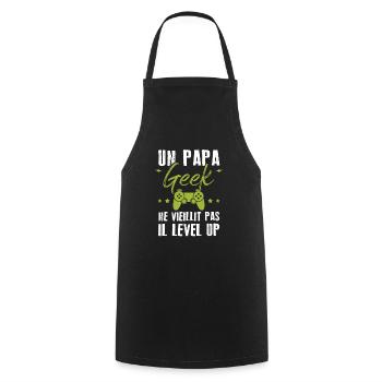 Un papa geek ne vieillit pas il level up - Tablier de cuisine - noir - Devant - AI Model Male 185 dark (185cm)