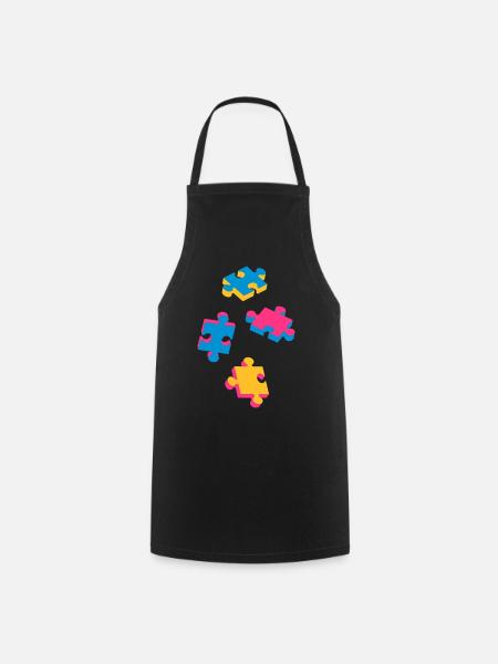 four puzzle pieces - Cooking Apron - black