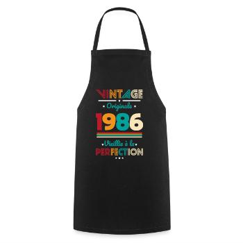 1986 – Vintage – Aged to perfection - Cooking Apron - black - Front - AI Model Male 185 dark (185cm)