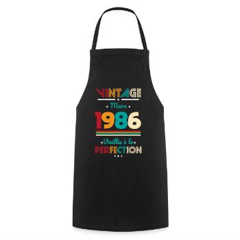 40-jähriges Jubiläum – Jahrgang – März 1986 - Kochschürze - Schwarz - Vorne - AI Model Male 185 dark (185cm)