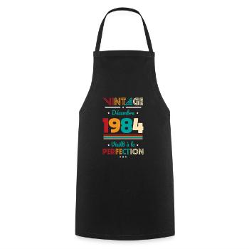 40 Years Anniversary - Vintage - December 1984 - Cooking Apron - black - Front - AI Model Male 185 dark (185cm)