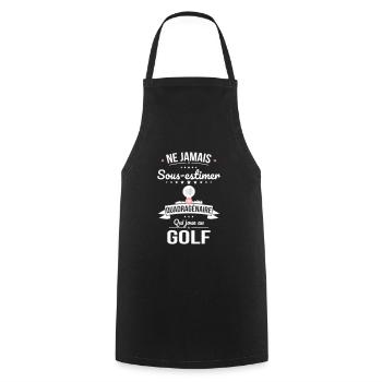 Sous-estimer une quadragénaire qui joue au golf - Tablier de cuisine - noir - Devant - AI Model Male 185 dark (185cm)