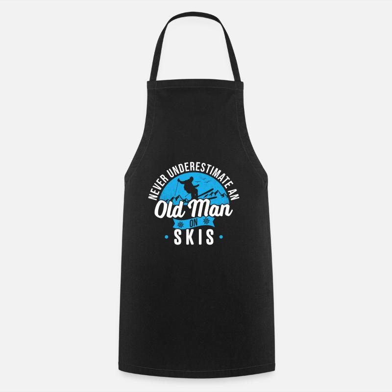 Never underestimate an old man on skis - Cooking Apron - black
