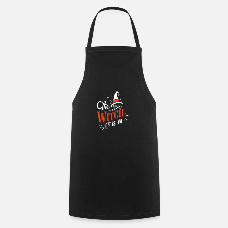The witch is in Halloween witch quote - Cooking Apron - black