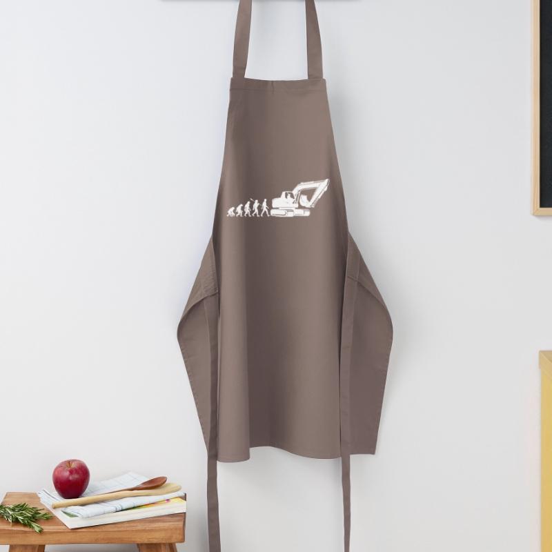 Evolution - driving an excavator - construction site, construction worker Cooking Apron