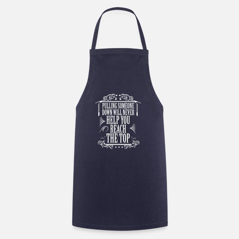 PULLING SOMEONE DOWN WILL NEHELP YOU REACH THE TOP - Cooking Apron - navy