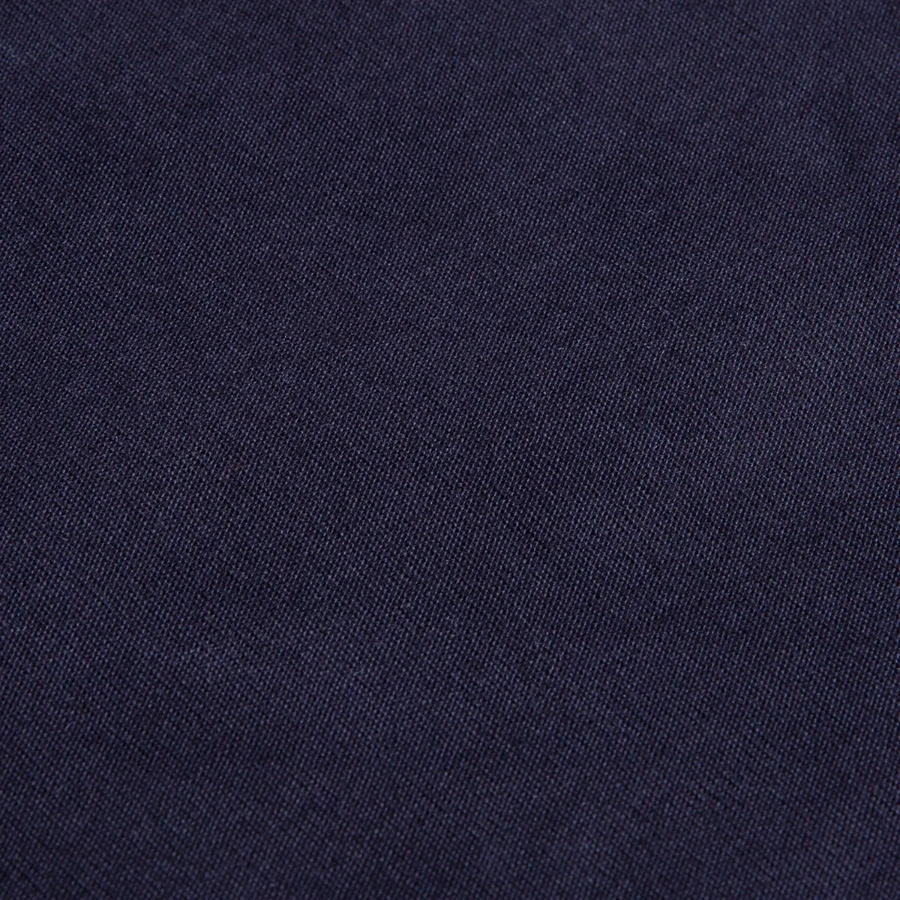 Hollow Peak badge on a cooking apron, navy, close-up
