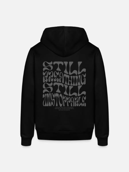 Still breathing, still unstoppable - Stanley/Stella SOUNDER Unisex Hoodie - black